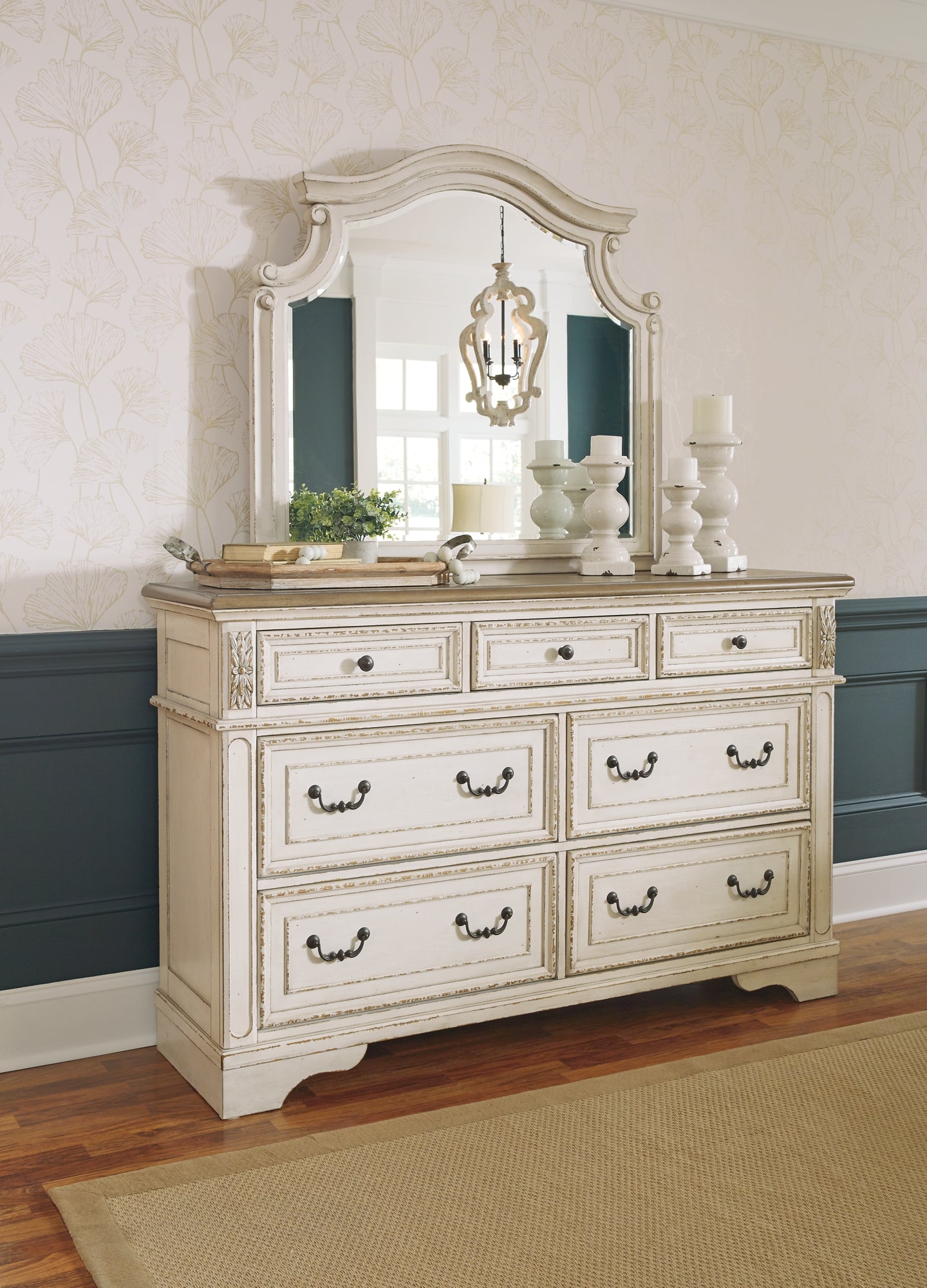 Realyn Upholstered Panel Bed With Mirrored Dresser And Chest