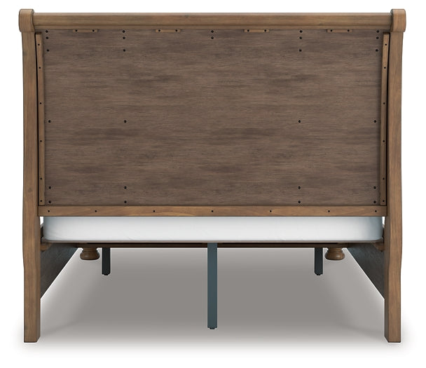 Feddinger Queen Storage Sleigh Bed with Mirrored Dresser