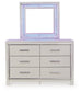 Zyniden King Upholstered Panel Bed with Mirrored Dresser, Chest and Nightstand