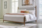 Lyncott Queen Upholstered Bed with Mirrored Dresser and Chest