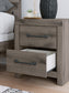 Graystorm King Panel Bed with Mirrored Dresser