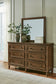 Sturlayne California King Upholstered Panel Bed with Mirrored Dresser, Chest and Nightstand