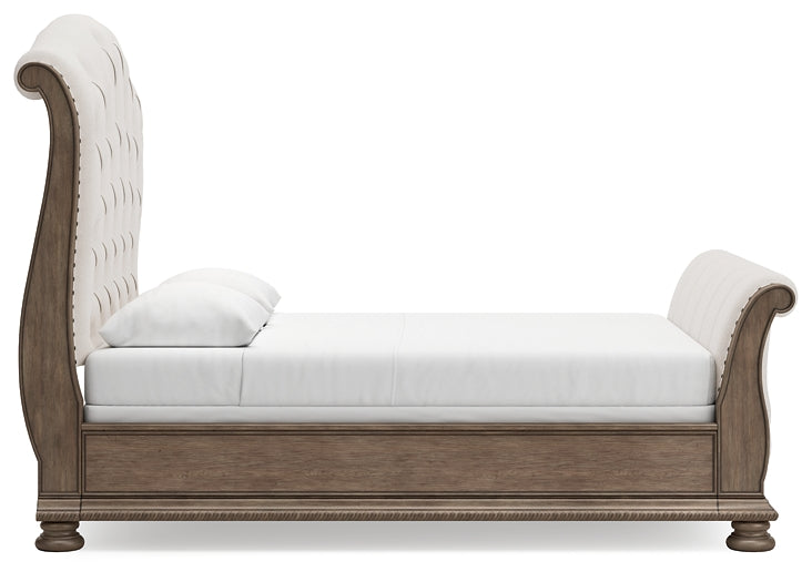 Ardenfield Queen Upholstered Sleigh Bed with Mirrored Dresser and Chest