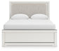 Zuraleus Queen Upholstered Panel Bed, Dresser, Mirror and Nightstand